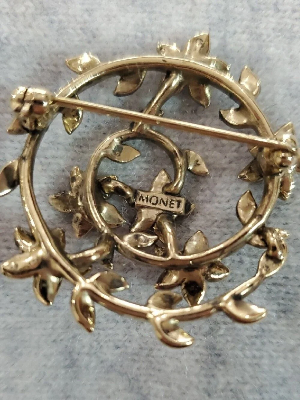 Monet Gold-Tone Floral Circle Brooch with Green, Purple, Blue Stones